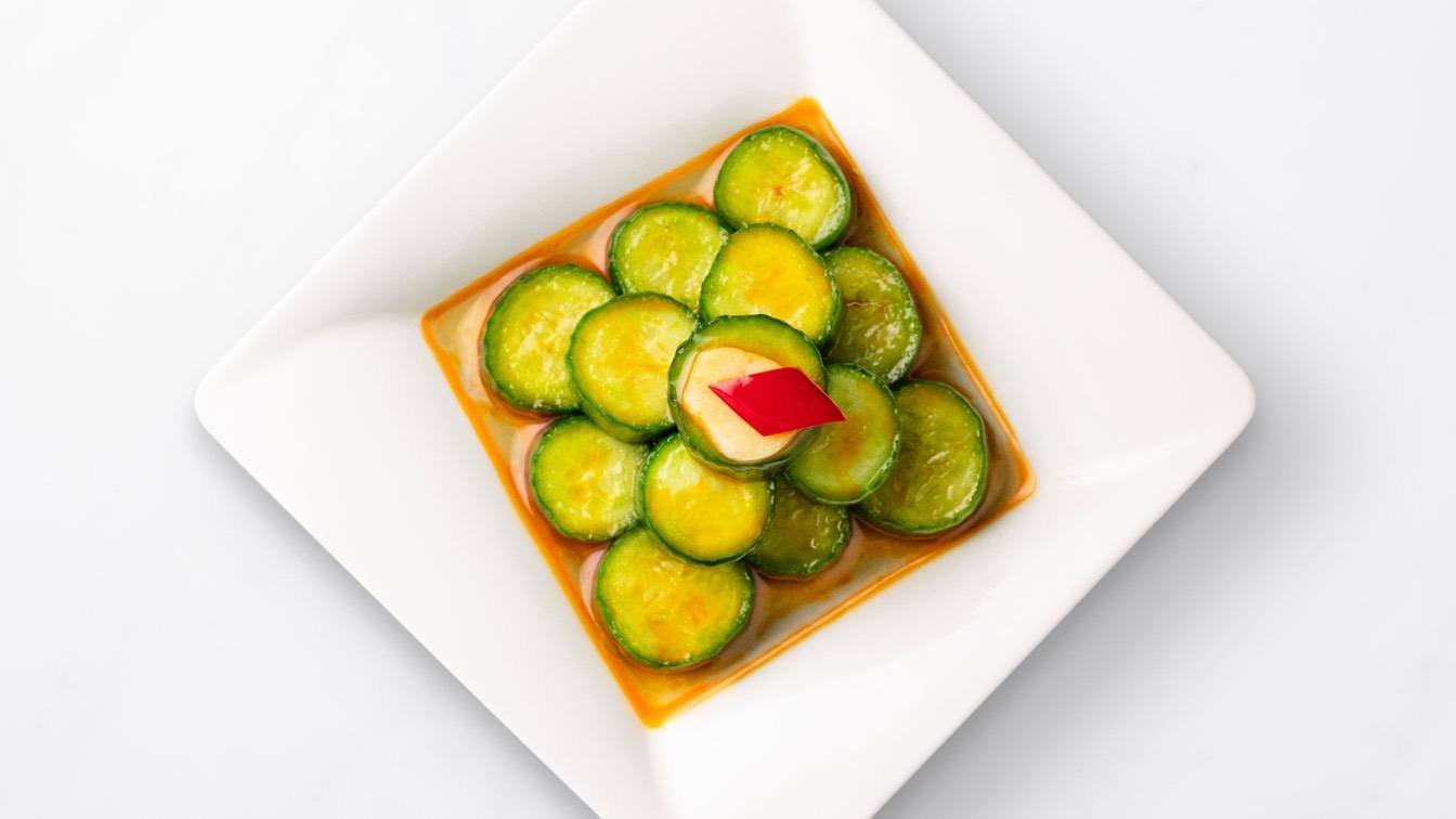 Cucumber Salad on white plate 