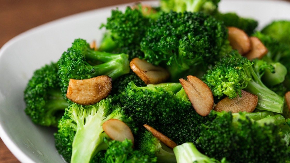 Sauteed Broccoli with Garlic in a white bowl, c