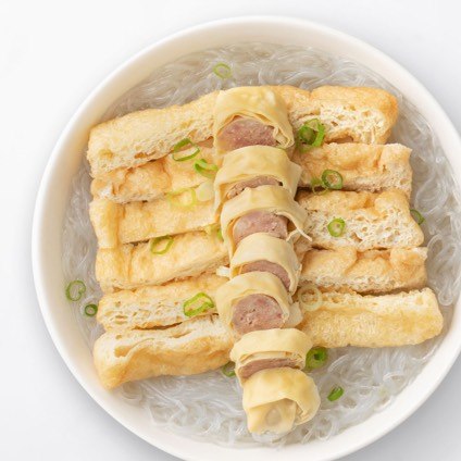 Tofu Puff & Glass Noodle Soup (Kurobuta Pork Roll) in a white bowl
