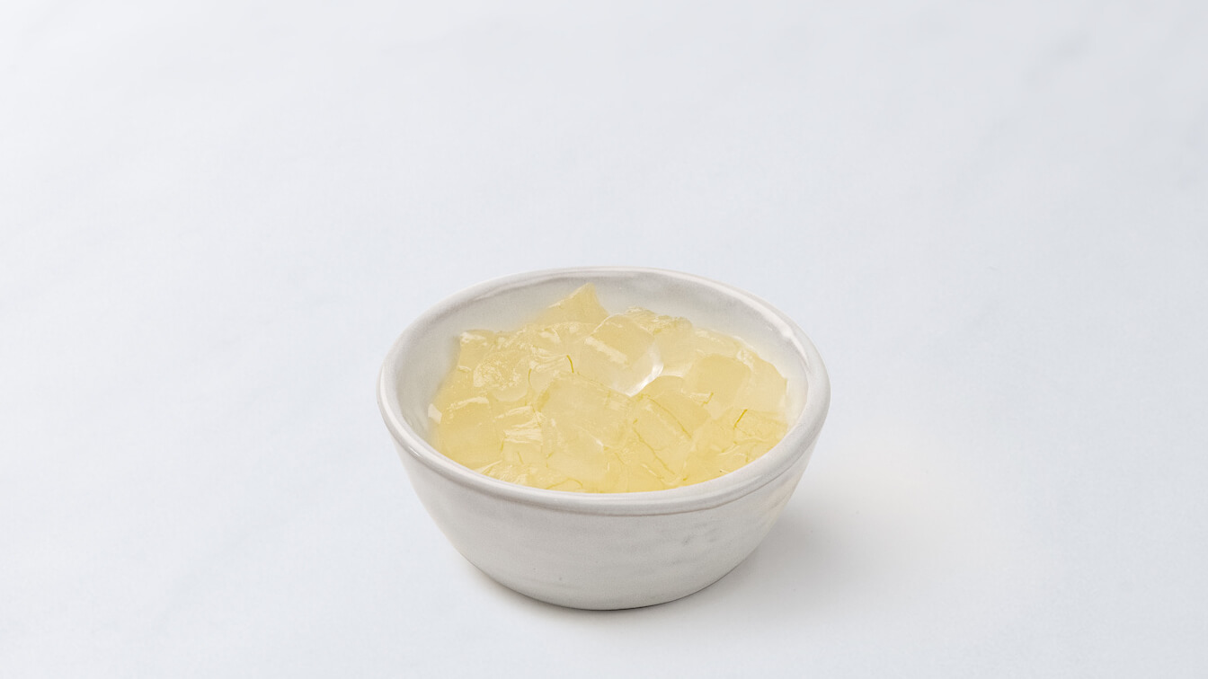 White bowl filled with aloe cubes